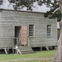 Is that a ghost girl peeking out of the Washington Roberts house?