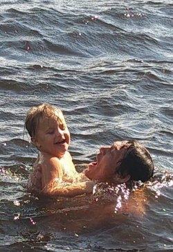 Should I Stay... Gus Sanchez and his son Bryson enjoy Lake Gaston during the evacuation.