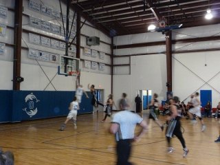 Another fuzzy photo, but check out how high Adam can jump!