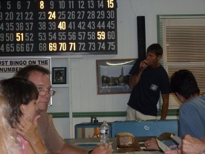 Good Night, Bingo Night Caller William Howard keeps the pace lively.
