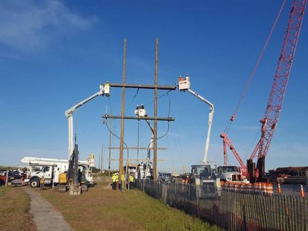 Electric Light at the End of the Tunnel New River EMC working on the complex and detailed process required to connect the new overhead cables to the grid. Thanks, y'all!