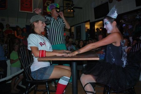 Babe Ruthless and Black Swan Tiny Dancer size each other up.