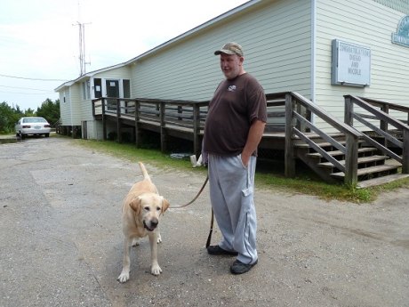 Ocracoke Pets Feel the Love Champ waited outside so he wouldn't scare the cats.