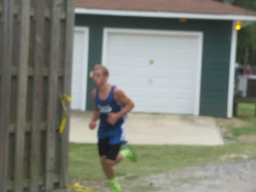Dolphins Are Conference Champs! Yes, I know this is a terrible picture but Adam was running very fast.