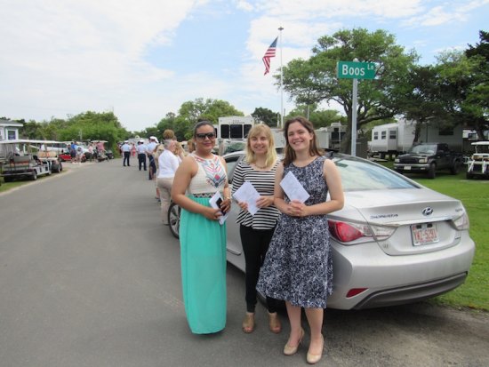 Ocracoke Honors WWII Sailors Seniors Arianna Contreras, Deana Seitz, and Caroline Temple handed out the programs at the ceremony.